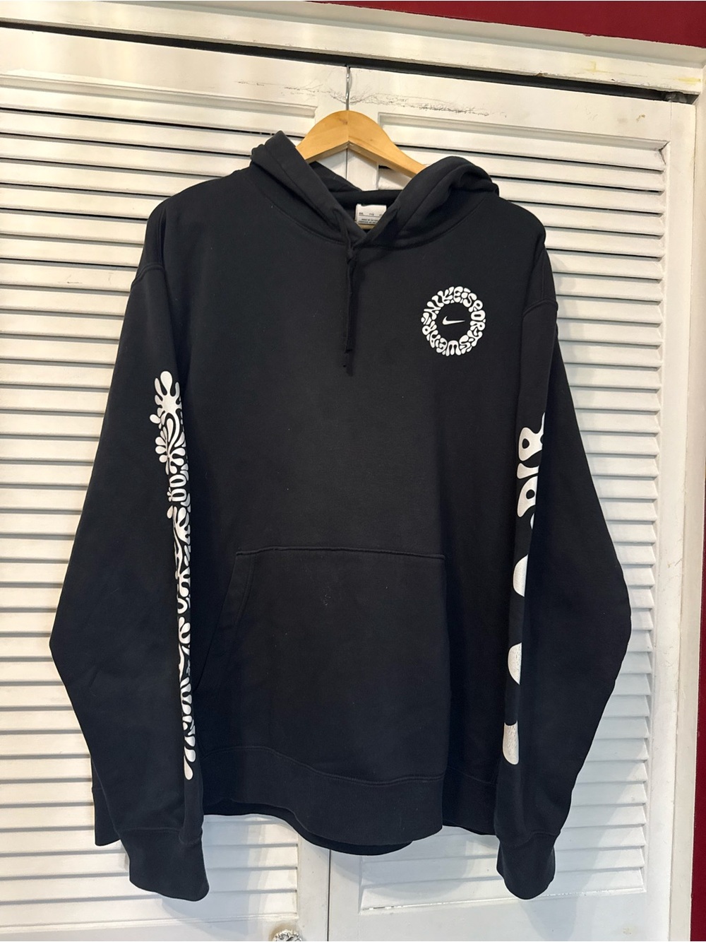 Nike Black Hoodie with White Graphic Sleeve and Chest Logos